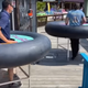 Image for article titled Maryland bar respects social distancing by getting its patrons to wear inflatable rubber tables